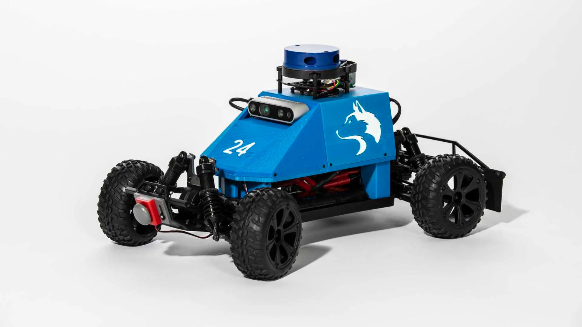 The mushr crawler robot with a blue chassis and multiple electronics.